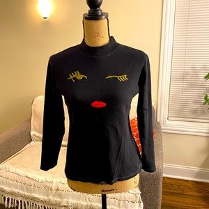 Winking eye sweater
